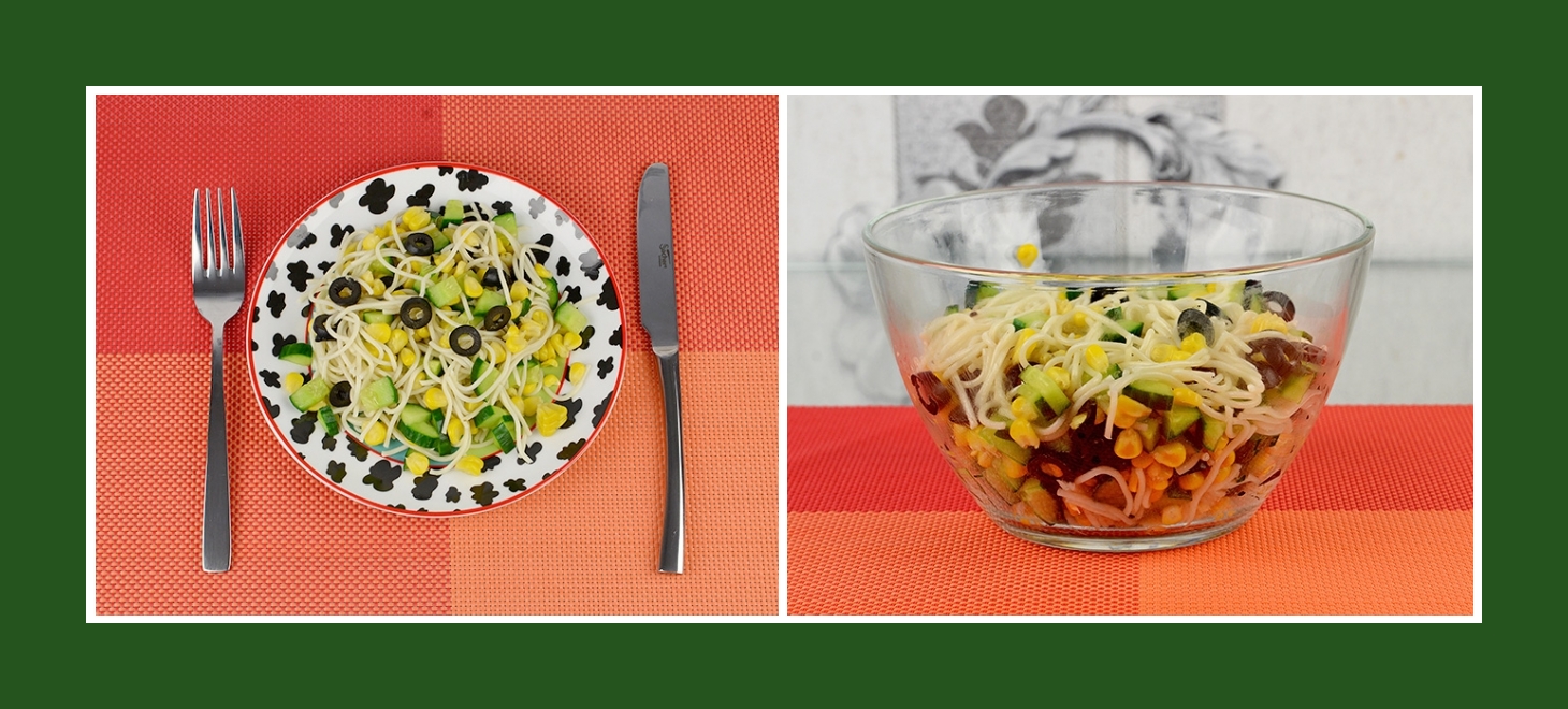 Salat aus Spaghetti, Oliven, Gurken und Mais